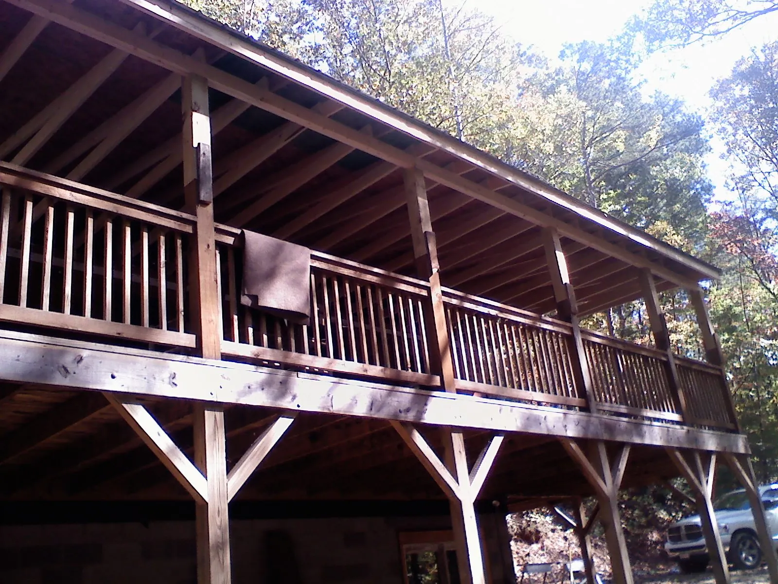 Timber framing under a new elevated porch and deck — Roof Leak Repair in Aliceville by Roofing Brothers